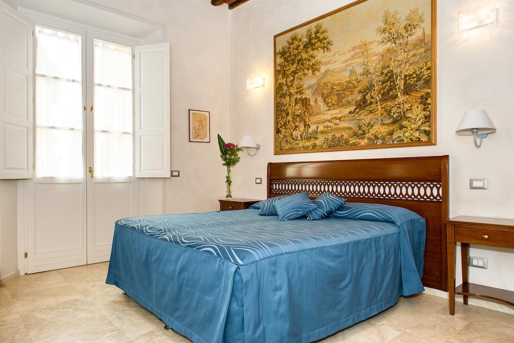 بيزا Relais Dei Mercanti B&B And Suites الغرفة الصورة